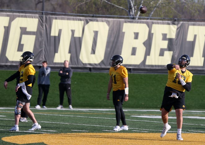 Iowa quarterback Deacon Hill (10) throws a pass in practice Thursday, April 11, 2024 in Iowa City, Iowa.