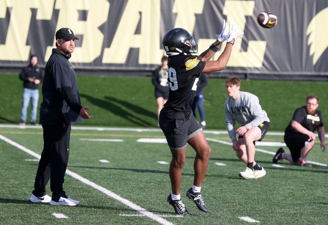 Iowa wide receiver Judah Mallette (29) reaches for a pass at practice Thursday, April 11, 2024 in Iowa City, Iowa.