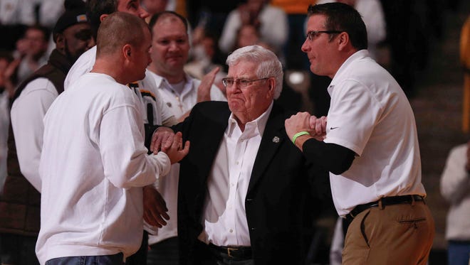 Former Iowa head basketball coach Tom Davis becomes emotional as he is introduced at Carver Hawkeye Arena in Iowa City on Saturday, January 20, 2018, during a ceremony honoring the 25th anniversary of the death of Chris Street.