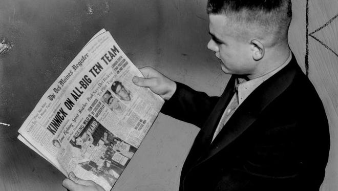 Nov. 20, 1937 - Nile Kinnick reads the Register on a stop in Des Moines. The story of the day was Kinnick being selected all-Big Ten halfback. Iowa was on its way to Lincoln, Neb., for a game with the University of Nebraska.