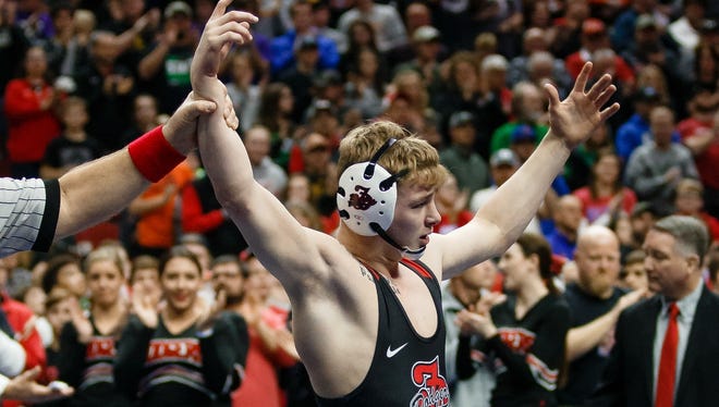 Fort Dodge's Brody Teske celebrates after beating Kaleb Olejniczak of Perry during their class 3A 126 pound championship match at Wells Fargo Arena on Saturday, Feb. 17, 2018, in Des Moines. This was Teske's his fourth state title.