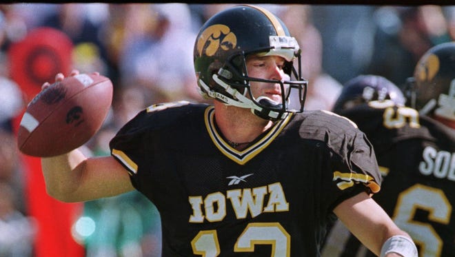 From 1998: Iowa quarterback Randy Reiners winds up on a long touchdown pass to Kevin Kasper against Northwestern.