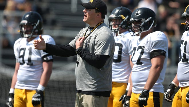 Iowa assistant coach Brian Ferentz directs a drill during spring practice on Saturday, April 11, 2015, at Valley Stadium in West Des Moines, Iowa.