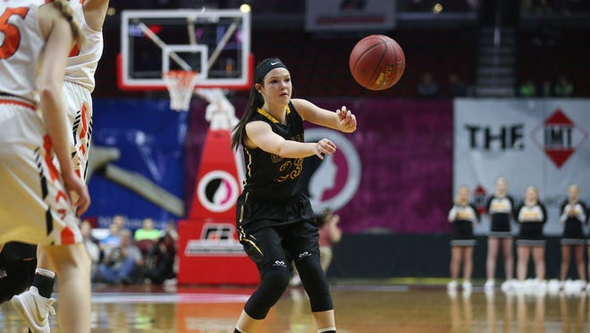 Garrigan's Jenna Boelter passes the ball during the Class 1A Girls' state basketball quarterfinal game between Springville and Algona Bishop Garrigan on Wednesday, Feb. 28, 2018, in Wells Fargo Arena. Springville won the game 54-36.
