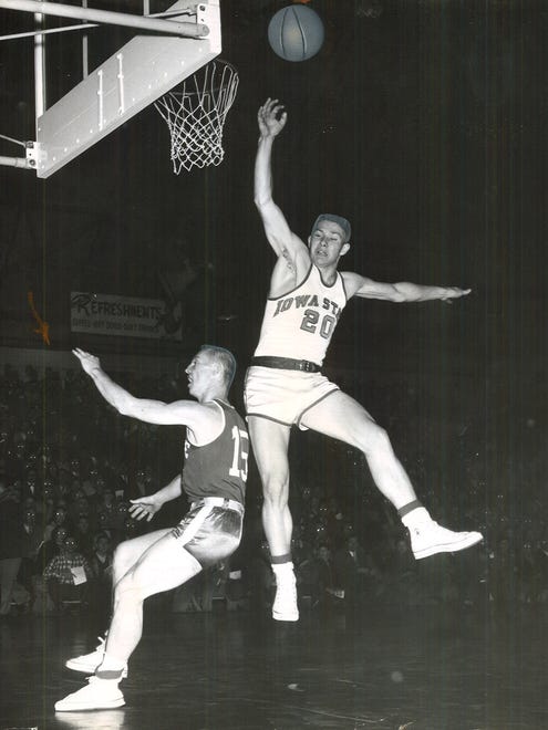 1956: Gary Thompson, right, springs into the air for a shot as Drake's Kent Gaer defends.