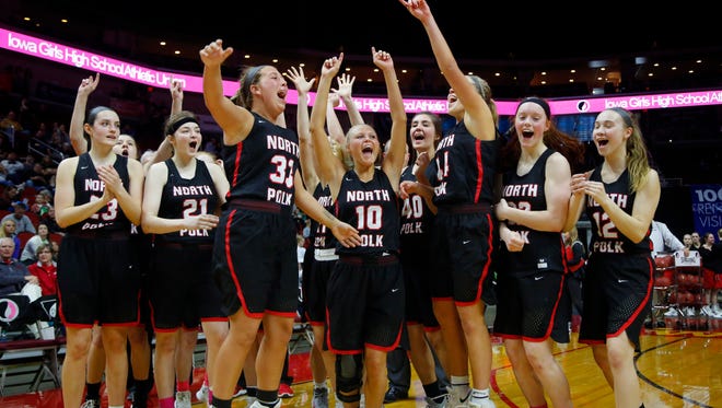 North Polk celebrates a win in the Class 3A-2 first round game against Davenport Assumption Tuesday, Feb. 27, 2018 at Wells Fargo Arena.