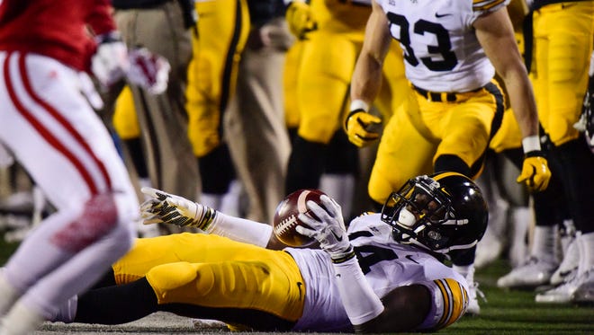 Iowa's Desmond King delivered a spectacular interception to tie Nile Kinnick's school record.