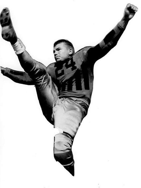 Undated photo - Nile Kinnick kicking pose in his Iowa uniforrm.