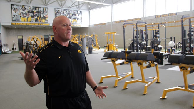 Iowa strength coach Chris Doyle makes more than 28 FBS public-school head coaches.