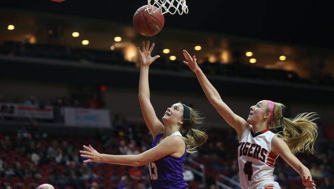 Indianola's Maggie McGraw shoots the ball during the Class 5A Girls' state basketball quarterfinal game between Indianola and Cedar Falls on Monday, Feb. 26, 2018, in Wells Fargo Arena.
