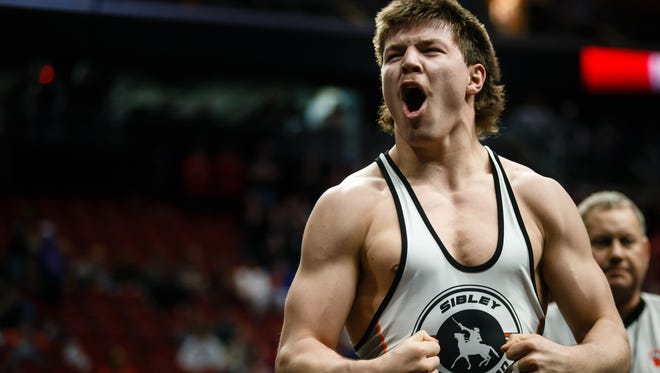 Hunter DeJong of Sibley-Ocheyedan celebrates his 9-3 decision over Hunter Hagen of West Hancock 195 lb 3A semi-final round at the state wrestling championships on Friday, Feb. 16, 2018, in Des Moines.