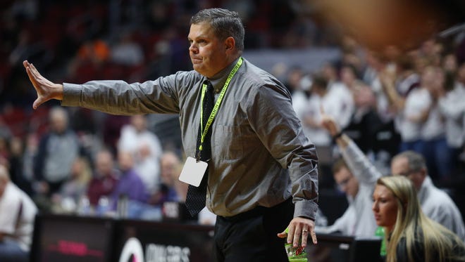 Iowa City West Coach BJ Mayer calls out a play during the Class 5A Girls' state basketball quarterfinal game between Dowling Catholic and Iowa City West on Monday, Feb. 26, 2018, in Wells Fargo Arena.