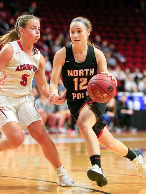Abi Zimmer of North Polk drives to the basket during the Class 3A-2 first round game against Davenport Assumption Tuesday, Feb. 27, 2018 at Wells Fargo Arena.