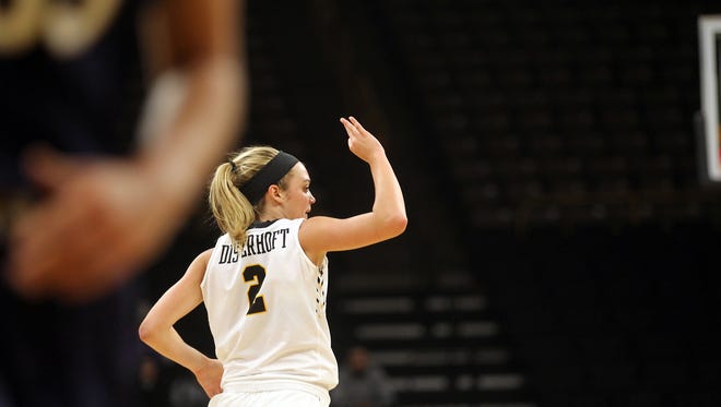 Iowa's Ally Disterhoft celebrates a 3-pointer during the Hawkeyes' game against Notre Dame at Carver-Hawkeye Arena on Wednesday, Nov. 30, 2016.