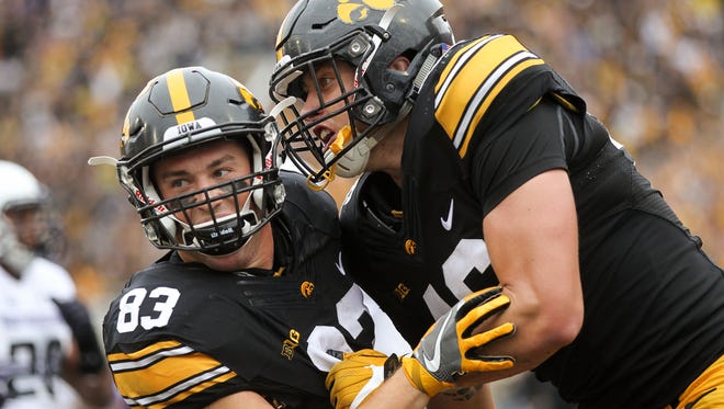 Iowa's Riley McCarron, left, celebrates his touchdown with George Kittle during the Hawkeyes' game against Northwestern at Kinnick Stadium on Saturday, Oct. 1, 2016.