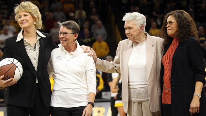 Lisa Bluder, from left, Paula Jantz, Dr. Christine Grant and C.Vivian Stringer are recognized prior to the Hawkeyes' game against Rutgers at Carver-Hawkeye Arena on Thursday, Feb. 2, 2017.