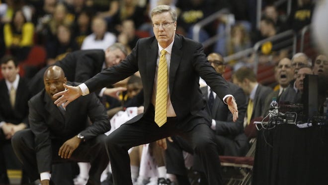 Iowa Hawkeyes head coach Fran McCaffery  signals his players during the second half of play against the Northern Iowa Panthers during the Big 4 Classic NCAA Mens Basketball tourney at the Wells Fargo Arena in Des Moines.