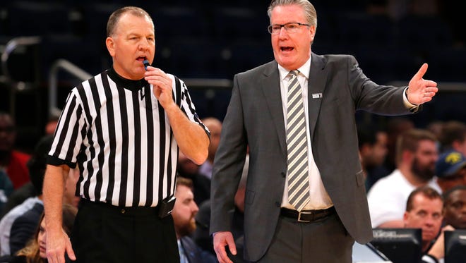 Feb 28, 2018; New York, NY, USA; Iowa Hawkeyes head coach Fran McCaffery talks to referee during first half of a first game of the 2018 Big Ten Tournament against Illinois Fighting Illini at Madison Square Garden. Mandatory Credit: Noah K. Murray-USA TODAY Sports