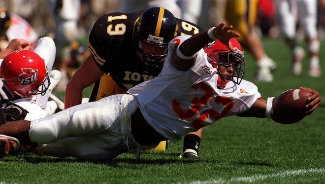 From 1998: Iowa defender Jeff Kramer stops Iowa State's J.J. Moses from reaching the end zone.