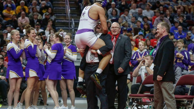 Lake Mills senior Slade Sifuentes celebrates after a state title win over West Hancock junior Hunter Hagen at 195 pounds during the Iowa Class 1A wrestling finals on Saturday, Feb. 18, 2017, at Wells Fargo Arena in Des Moines.