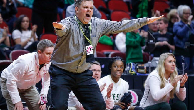 Iowa City West girls head basketball coach BJ Mayer reacts to a play against Indianola during the 5A semifinal game at the girls state basketball tournament on Thursday, March 1, 2018, at Wells Fargo Arena in Des Moines.