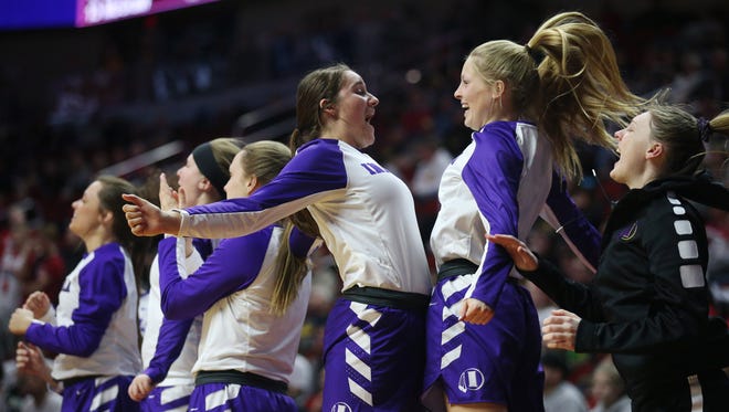 Indianola players celebrate during the Class 5A Girls' state basketball quarterfinal game between Indianola and Cedar Falls on Monday, Feb. 26, 2018, in Wells Fargo Arena. Indianola won the game 64-63.