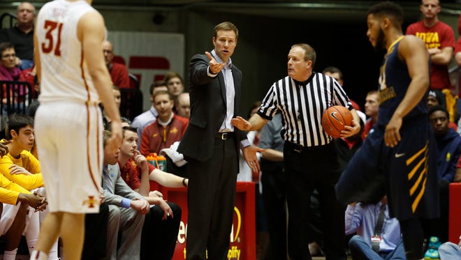 Iowa State head coach Fred Hoiberg questions a call Feb. 14, 2015, during the Cyclones 79-59 win over the Mountaineers at Hilton Coliseum in Ames.