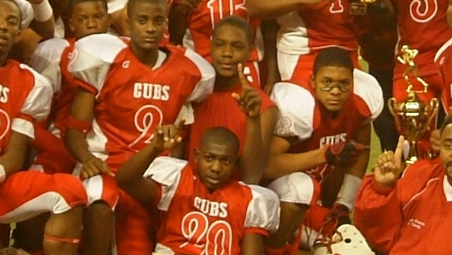 Back in 2009, Desmond King (No. 20), Malik McDowell (pointing finger) and Jourdan Lewis (No. 2) were teammates on the Westside Cubs.