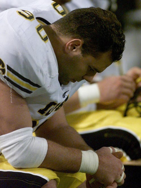 From 1998: Iowa senior Aron Klein didn't care to watch the final minutes of the final game of his collegiate football career Nov. 21, 1998 at Minnesota.