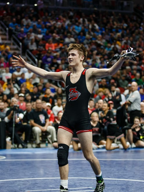 Drew Bennett of Fort Dodge celebrates a 9-4 win over Pleasant ValleyÕs Eli Loyd during their class 3A 132 pound championship match at Wells Fargo Arena on Saturday, Feb. 17, 2018, in Des Moines.