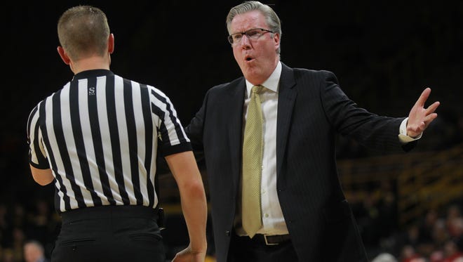 Iowa head coach Fran McCaffery calls to Jordan Bohannon (not pictured) after a foul during the Hawkeyes' game against Ohio State at Carver-Hawkeye Arena on Thursday, Jan. 4, 2018.