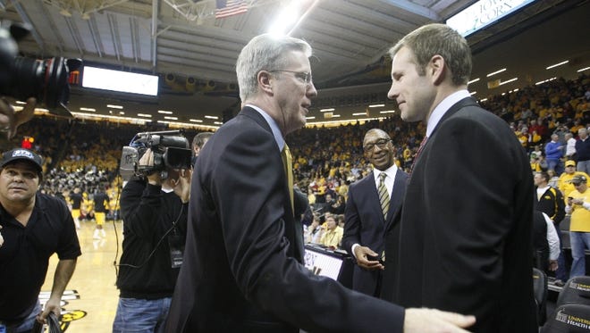 des.s1208iowambb - Iowa State head coach Fred Hoiberg is greeted by Iowa coach Fran McCaffery prior to an NCAA men's college basketball game between Iowa State and the University of Iowa on Friday, Dec. 7, 2012 in Iowa City, Iowa.