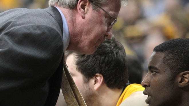 Iowa head coach Fran McCaffery shouts at Anthony Clemmons during their first-round NIT game against Indiana State at Carver-Hawkeye Arena on Wednesday, March 20, 2013.