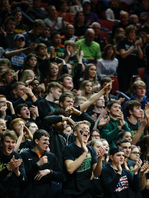 Iowa City, West fans cheer during the first half of their 5A state championship game at Wells Fargo Arena on Friday, March 2, 2018, in Des Moines. West takes a 21-16 lead into halftime.