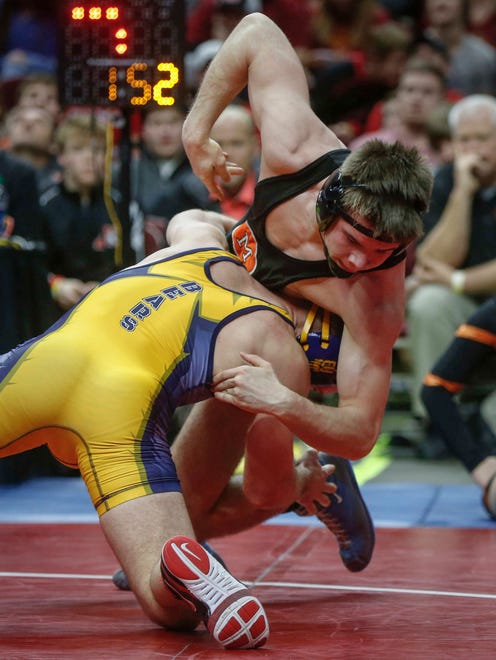 English Valleys senior Zachary Axmear shoots in on Mediapolis senior Brennan Swafford in their 1A match at 152 pounds during the Iowa Class 1A wrestling finals on Saturday, Feb. 18, 2017, at Wells Fargo Arena in Des Moines.