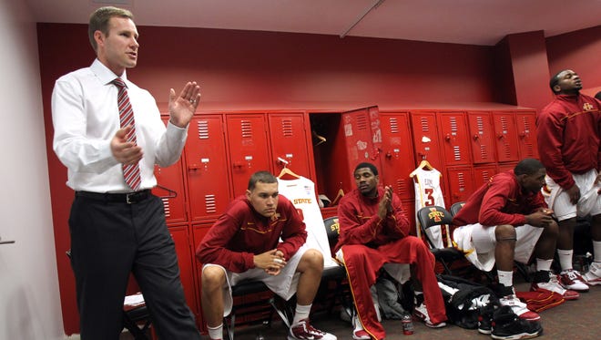Coach Fred Hoiberg speaks to his  team before the season opener and Hoiberg's collegiate coaching debut Nov. 12, 2010, against Northern Arizona at Hilton Coliseum in Ames.