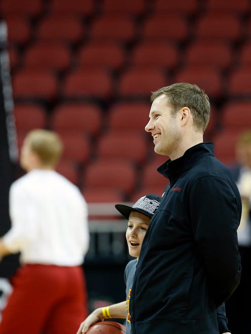 Iowa State's coach Fred Hoiberg watches his team practice  at the KFC Yum! Center on March 18, 2015, during the NCAA tournament.