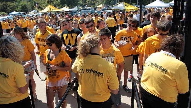 University of Iowa students enter Kinnick Stadium for the game against Northern Illinois on Aug. 31. 2013.