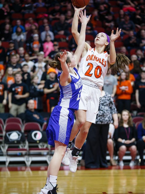 Springville's Rylee Menster (20) shoots during the second half of their 1A girls state basketball championship game at Wells Fargo Arena on Saturday, March 3, 2018, in Des Moines. Springville would go on to win 60-49.