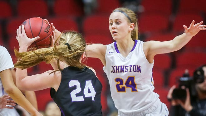 Johnston's(24) Macy Thompson guards Waukee's(24) Jori Nieman during their first round 5A matchup in the girls' state basketball tournament Monday, Feb. 26, 2018, at Wells Fargo Arena in Des Moines, Iowa.