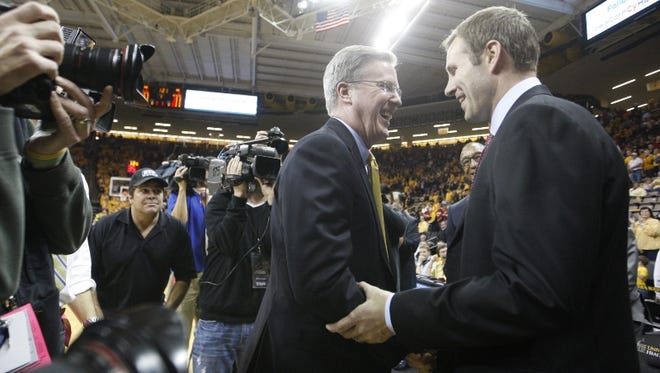 Iowa State head coach Fred Hoiberg is greeted by Iowa coach Fran McCaffery prior to an NCAA men's college basketball game between Iowa State and the University of Iowa on Friday, Dec. 7, 2012 in Iowa City, Iowa.
