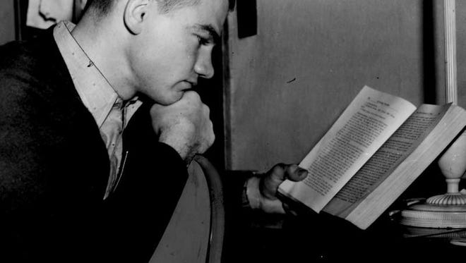 Jan. 25, 1940 - Nile Kinnick studies for semester exams at the University of Iowa.