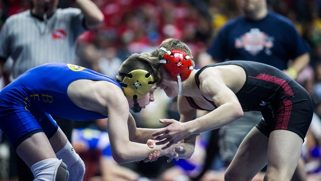 during the first round of the Iowa high school state wrestling championship on Thursday, Feb. 15, 2018, in Wells Fargo Arena.