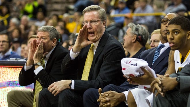 Iowa coach Fran Mccaffery calls out an offensive play Saturday afternoon, November 4, 2012, at Carver-Hawkeye arena in Iowa City. The Hawkeyes won handidly over the visiting Hawks from Quicy, 100-54 in the exhibition match-up.