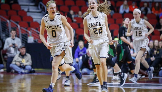 Cascade sophomore Skylar Dolphin, left, and junior Rachel Trumm react after Dolphin scored a field goal against North Union on Friday, March 2, 2018, at Wells Fargo Arena in Des Moines.
