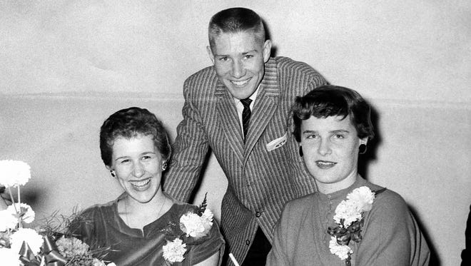 1957: Iowa State All-American Gary Thompson poses with Sylvia Froning, left, of Garrison's girls basketball champions and Sandy Fiete, the Iowa Wesleyan All-America, when they got together for a "Dinner of Champions" in Vinton. Froning was an all-state player as were Miss Fiete, at Garnavillo, and Thompson at Roland.