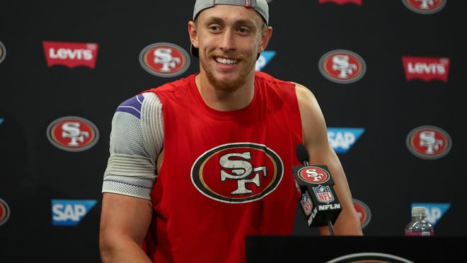FILE - In this Nov. 1, 2018, file photo, San Francisco 49ers tight end George Kittle speaks at a news conference after an NFL football game against the Oakland Raiders in Santa Clara, Calif. Now heading into the final game of the season, Kittle is in a battle with Kansas City's Travis Kelce in a race for the most productive season ever for a tight end. (AP Photo/Ben Margot, File)