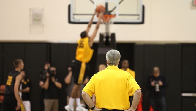 Coach Fran McCaffery watches practice on Thursday at Carver Hawkeye Arena in Iowa City during the University of Iowa men's basketball media day.