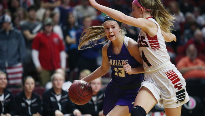 Indianola's Maggie McGraw drives to the hoop during the Class 5A Girls' state basketball quarterfinal game between Indianola and Cedar Falls on Monday, Feb. 26, 2018, in Wells Fargo Arena.