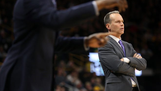 Northwestern head coach Chris Collins watches the Wildcats face Iowa at Carver-Hawkeye Arena on Sunday, Feb. 25, 2018.